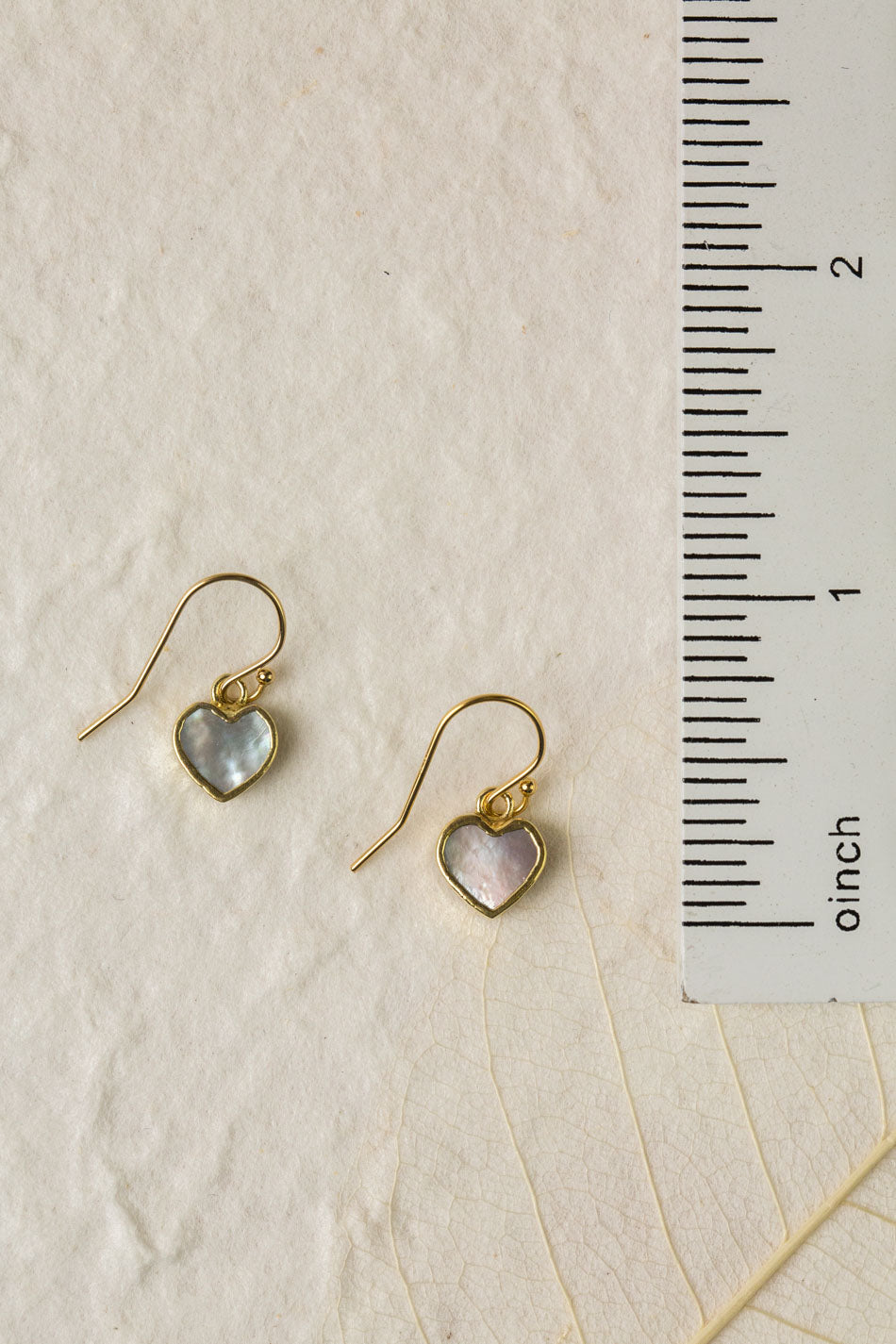 Contentment Mother Of Pearl Bezel Heart Simple Earrings