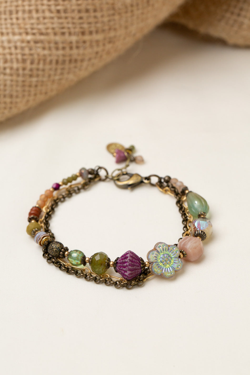 Wildflower 7.5-8.5" Czech Glass Holographic Flower, Peach Moonstone Multistrand Bracelet